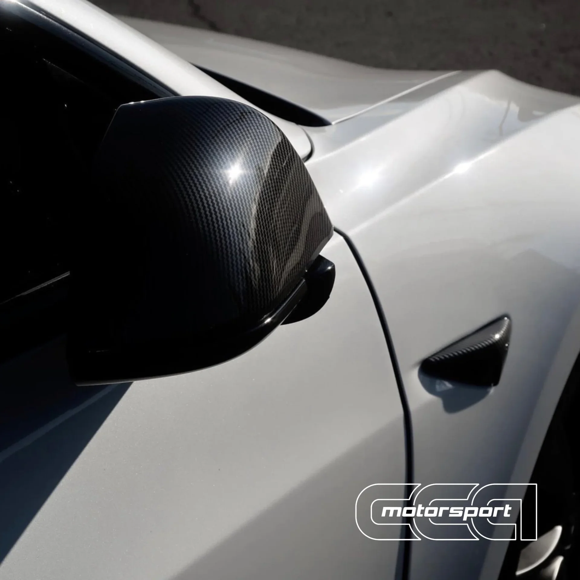 2022 Tesla Model 3 — Carbon fiber accent wraps